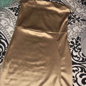 Gold silk dress with slit detail on leg